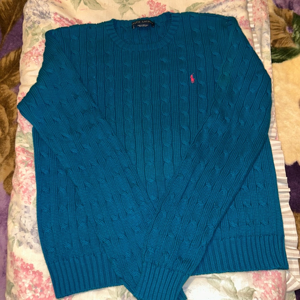 Love this sweater comfy and color is amazing